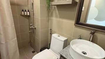 Hair dryer, towels, soap, shampoo