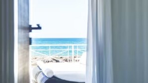 A room with a view of the ocean through a window. - Riva Estate Villa by LeDhome (Trappeto)