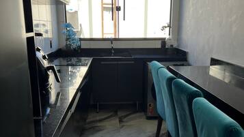 Fridge, microwave, stovetop, electric kettle