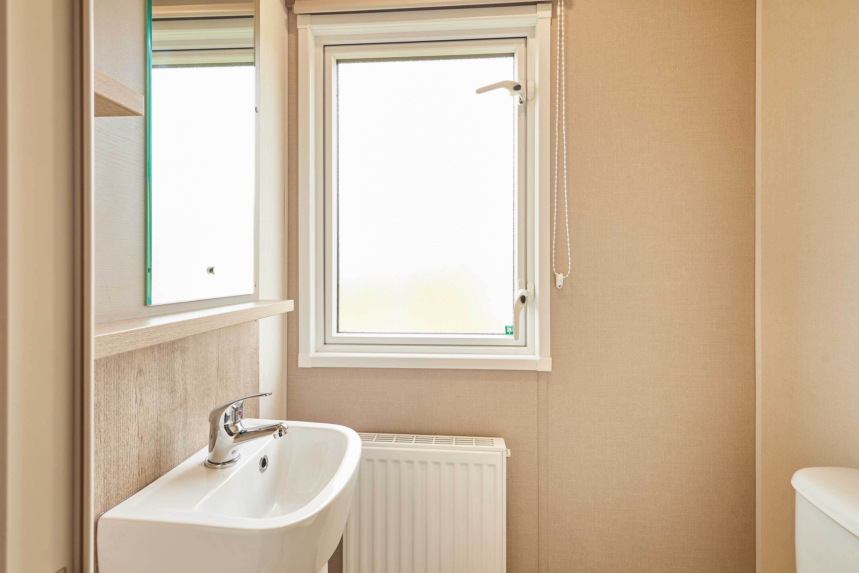 Shower, hair dryer, towels, shampoo