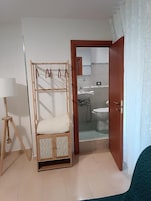 Double Room, Balcony, City View | Bathroom | Shower, free toiletries, hair dryer, towels
