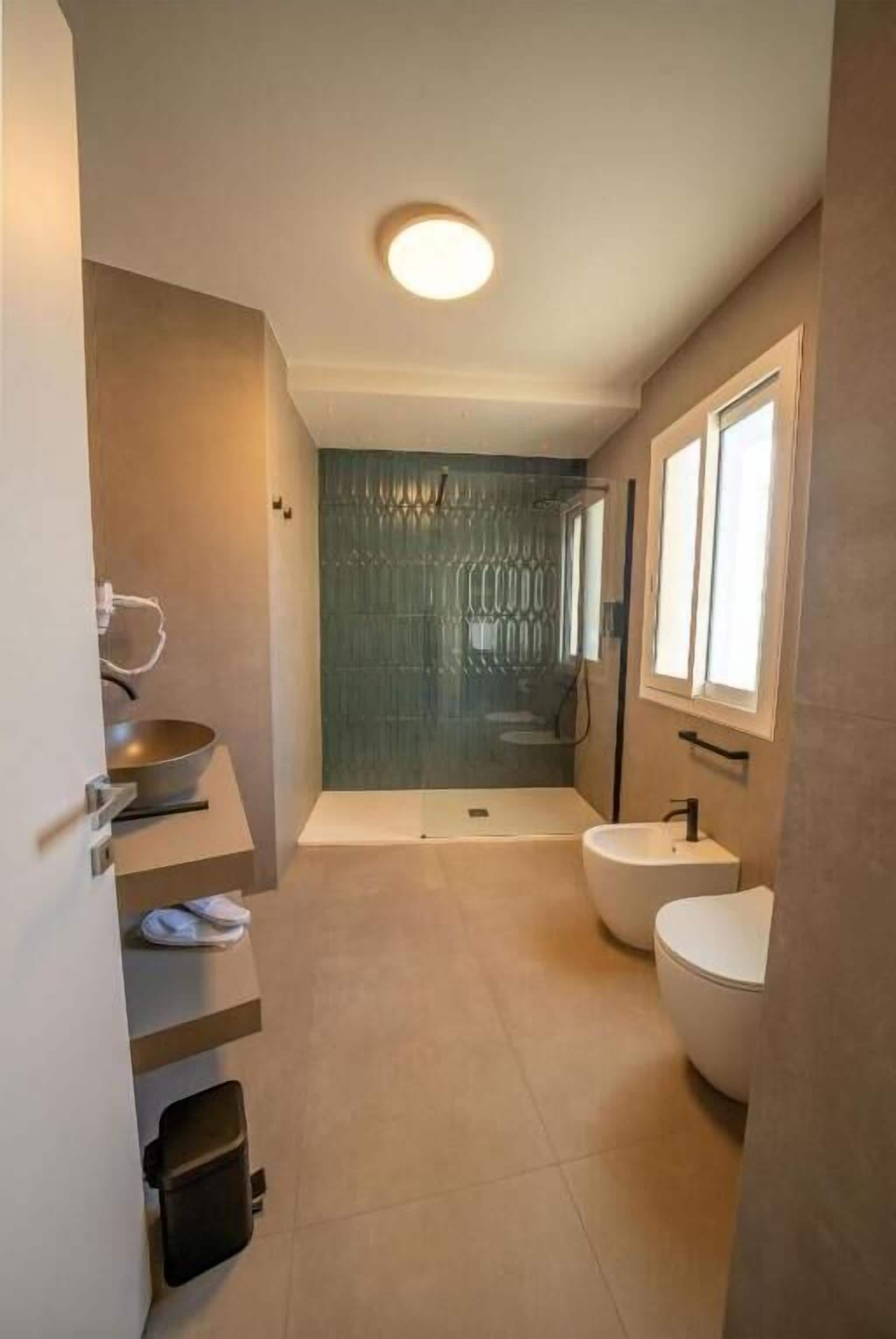 Superior Double Room, Balcony, City View | Bathroom | Slippers