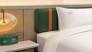 Down comforters, desk, blackout drapes, soundproofing
