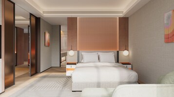 Down comforters, desk, blackout drapes, soundproofing