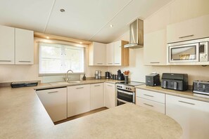 Fridge, microwave, oven, stovetop - Host & Stay | Hoganwoods Lodge (Wooler)