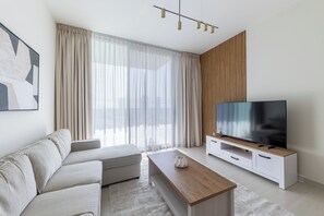 Apartment, Balcony, City View | Living area - Modern 1BR Apartment with City View (Dubai)