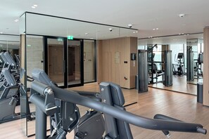 Apartment, Balcony, City View | Fitness facility - Modern 1BR Apartment with City View (Dubai)