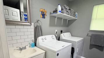 Hair dryer, towels, soap, toilet paper