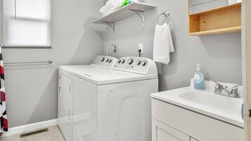 Hair dryer, towels, soap, toilet paper