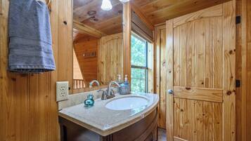 Romantic Cabin, Mountain View | Bathroom | Hair dryer, towels, soap, toilet paper