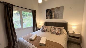 2 habitaciones, wifi gratis y ropa de cama