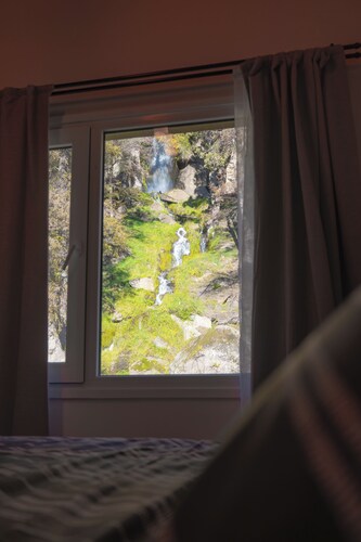 Rest with the best view of the waterfall I Ayres del Bosque Accommodations