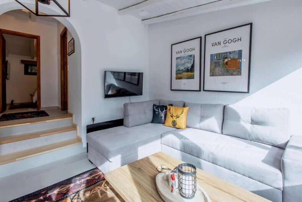 Deluxe Studio | Living area | 32-inch Smart TV with premium TV channels