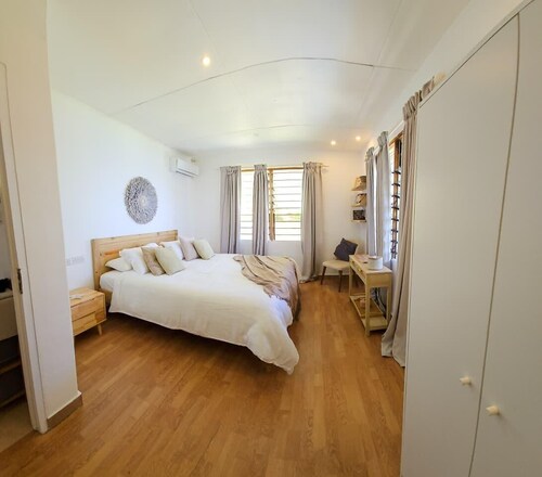 Two Bedroom Treehouse inspired home with amazing views of Beau Vallon