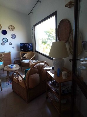 Living area - Cozy Cottage (Trinità d'Agultu e Vignola)