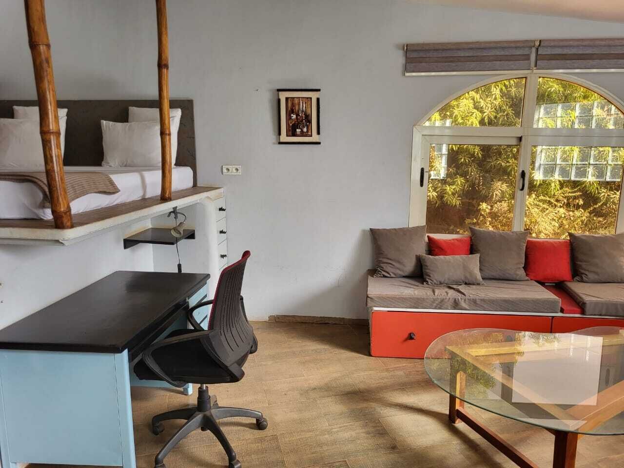 Deluxe Studio Suite, Pool View | In-room safe, desk, blackout curtains, soundproofing