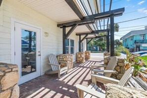 Terrace/patio - 🐾 Lofty Suites: Ground Floor, Dogs Welcome + Walk Flagler Ave to Beach! (New Smyrna Beach)