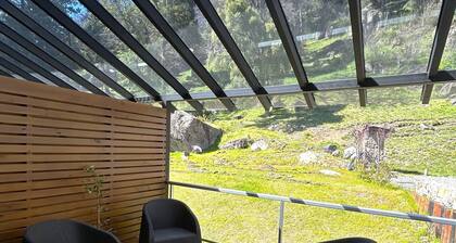 Enjoy with your family the best view of the waterfall I Ayres del Bosque Accommodations
