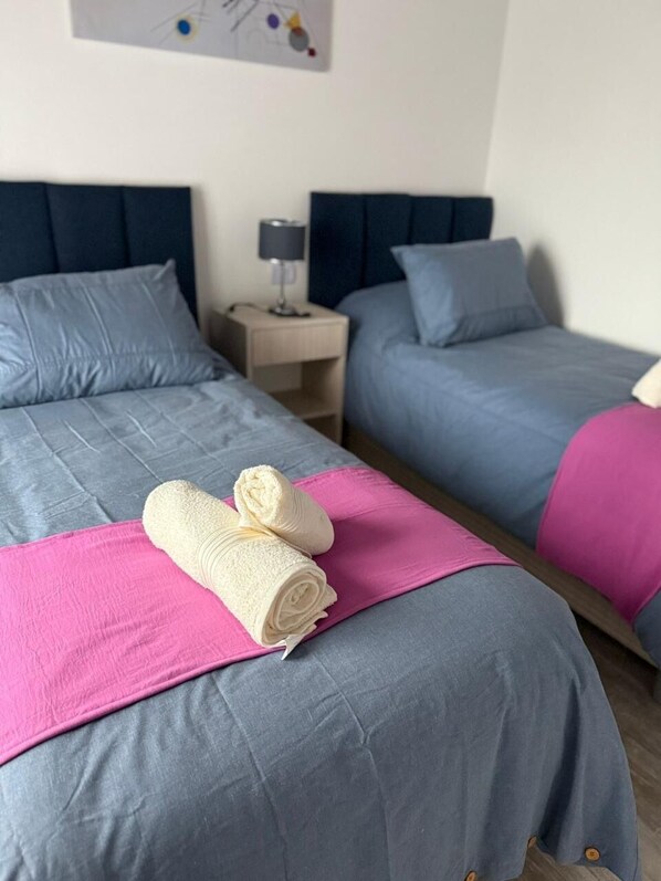 2 habitaciones, wifi gratis y ropa de cama 