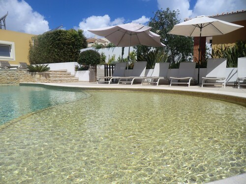 Beautiful villa near Meia Praia, Lagos with solar heated pool & lots of space