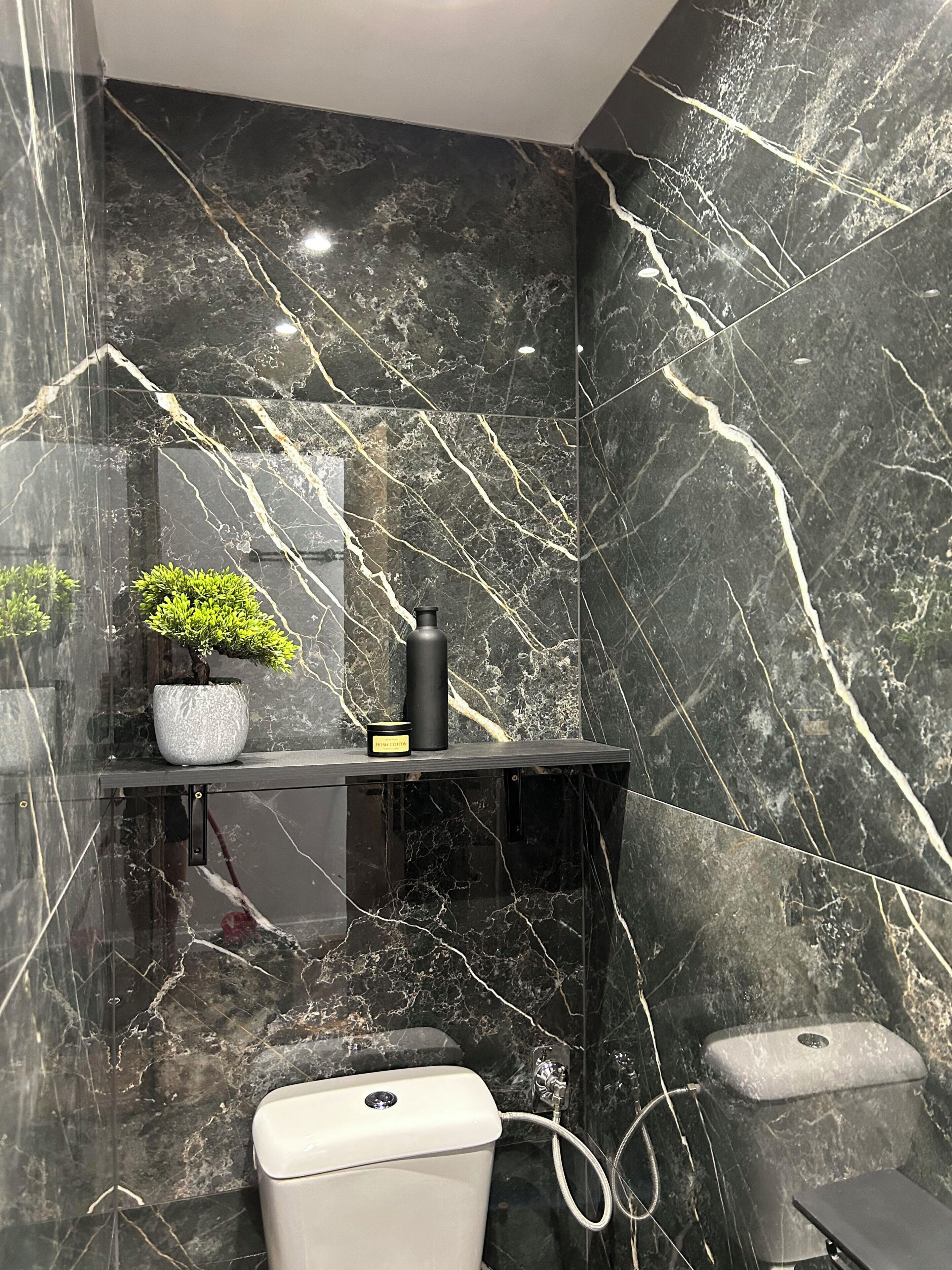 Shower, hair dryer, towels, toilet paper