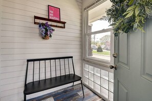 A bench, a door, a window, and a sign with the text 'YOU ARE BEAUTIFUL.' - Cute-Downtown Getaway! (Indianapolis)