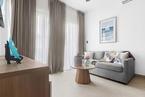 Apartment, 1 Queen Bed, Hot Tub, City View (Unique A-101) | Living area - NOK 1BR Apartment w/ Pool Unique Vistacana (Punta Cana)