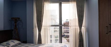 Double Room, Balcony, City View | In-room safe, soundproofing, iron/ironing board, free WiFi