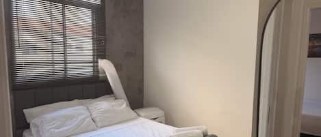 2 bedrooms, desk, iron/ironing board, travel cot