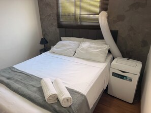 2 bedrooms, desk, iron/ironing board, travel cot