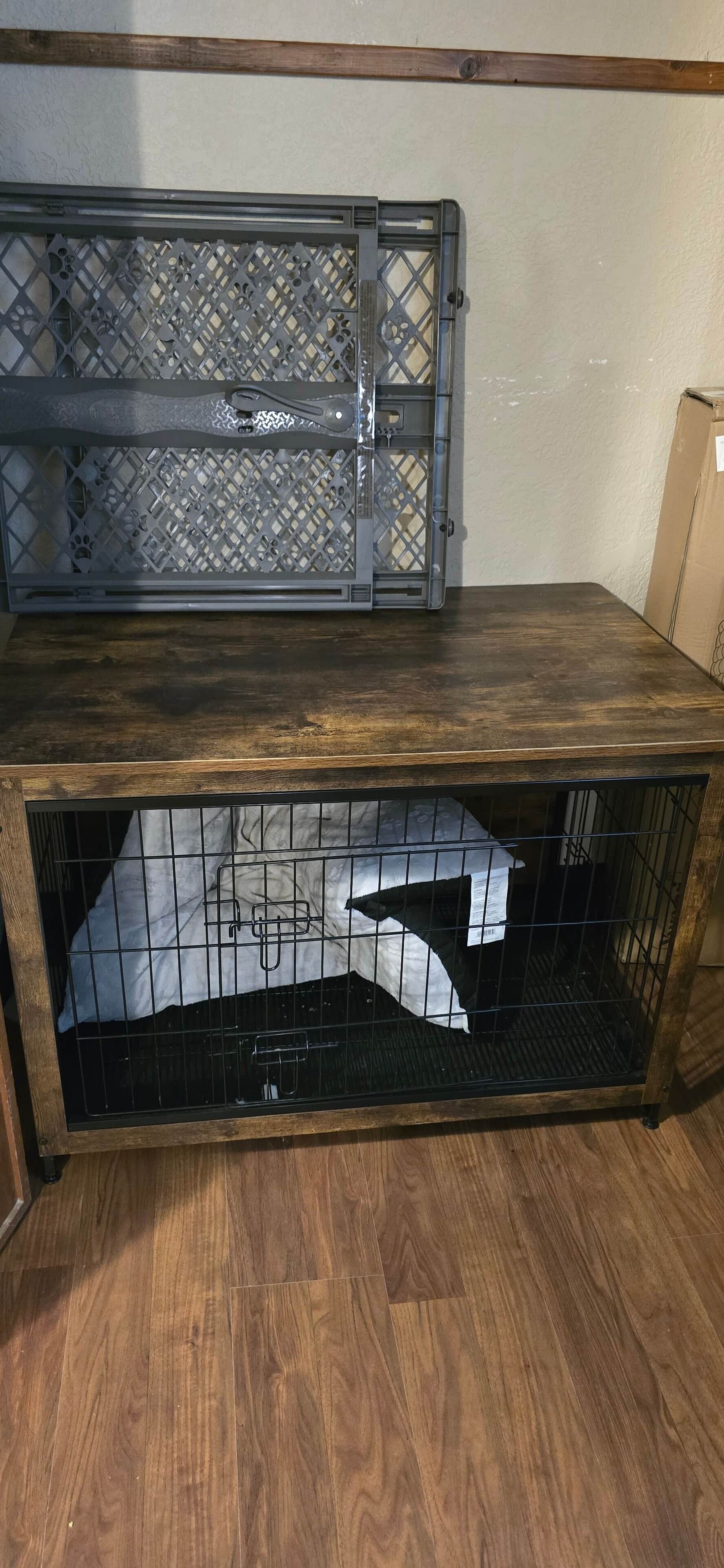 A wooden bench with a metal cage-like structure on top.