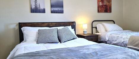 3 bedrooms, desk, iron/ironing board, travel cot