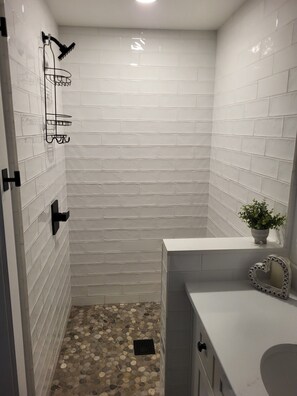 Hair dryer, towels, soap, toilet paper