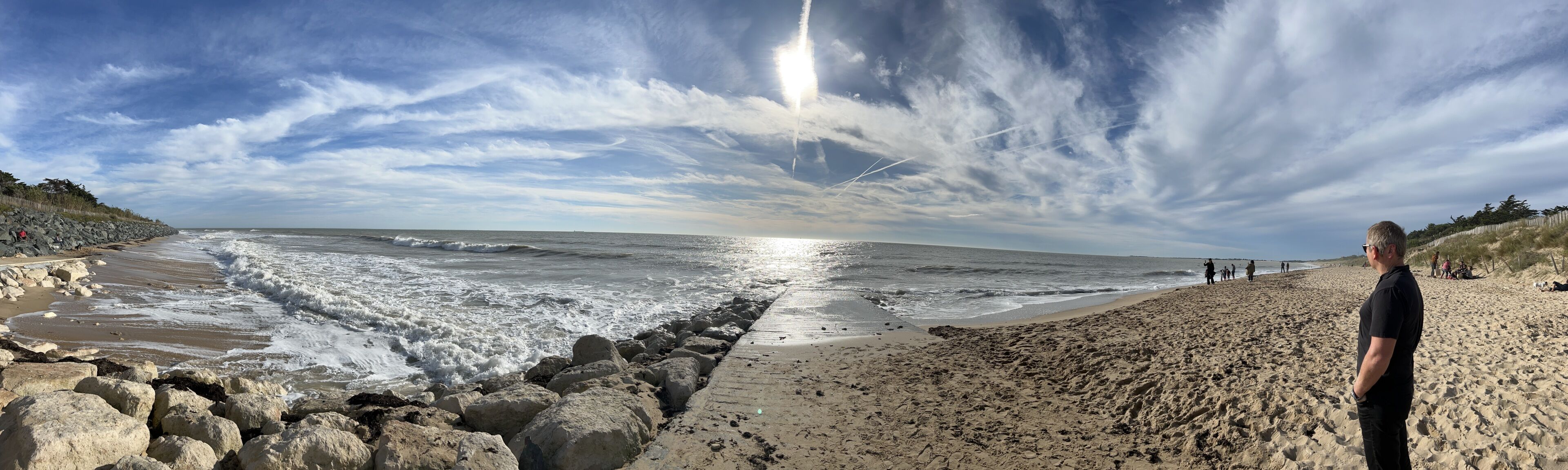 On the beach, sun-loungers