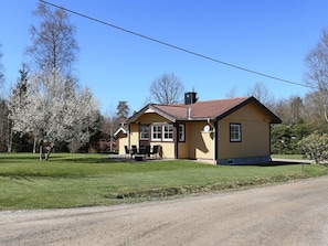 A single-story house with a red-tiled roof, a small porch, and a lawn in front. - 6 Person Holiday Home in Ljungbyhed (Ljungbyhed)