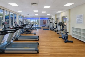 A gym with treadmills, elliptical machines, and weight equipment. - L17 Small Studio Suite 2 Beds Pool Spa (Surfers Paradise)