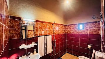 Shower, free toiletries, towels, soap