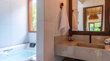 Departamento Deluxe, vista al jardín | Baño