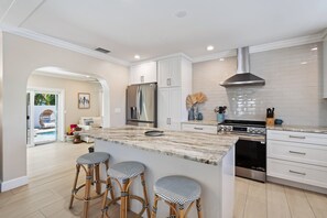 Fridge, microwave, oven, stovetop - Sandcastle By The Sea by SeaBreeze Vacation (Holmes Beach)