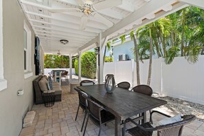 Outdoor dining - Sandcastle By The Sea by SeaBreeze Vacation (Holmes Beach)