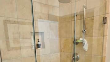 Shower, hair dryer, towels, toilet paper