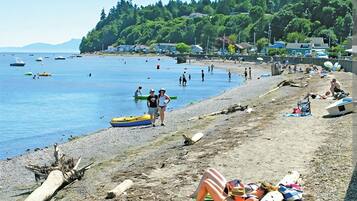 On the beach, sun loungers, beach towels