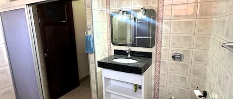 Shower, towels, soap, toilet paper