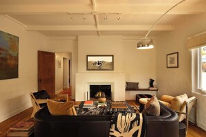 TV, fireplace, offices - The Tucson Bungalow | Designer Sam Hughes Retreat (Tucson)