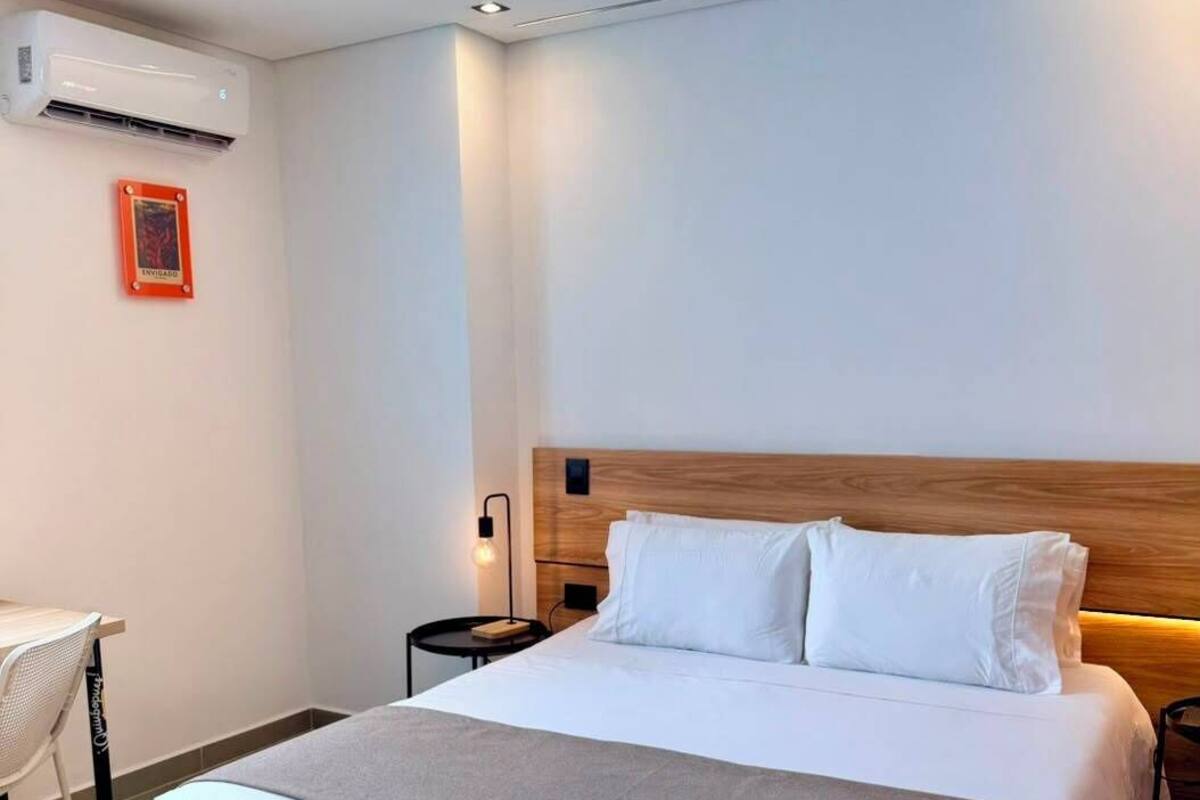 Desk, laptop workspace, free WiFi, bed sheets