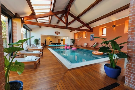 Indoor pool, a heated pool. Casa Vamaë | Heated pool & cinema