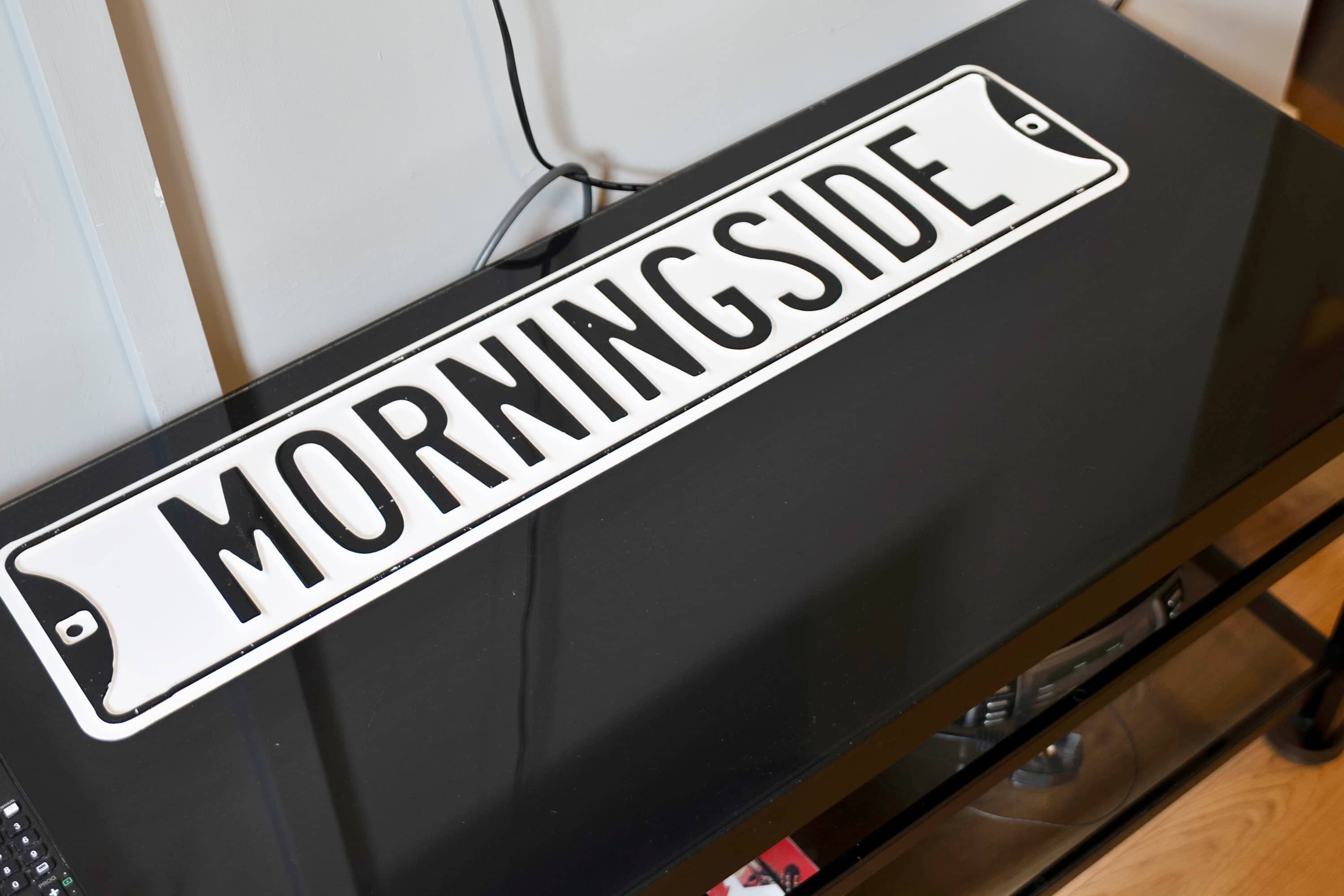 A black sign with the words 'MORNINGSIDE' on it.
