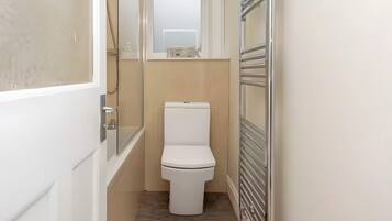 Shower, hair dryer, towels, shampoo