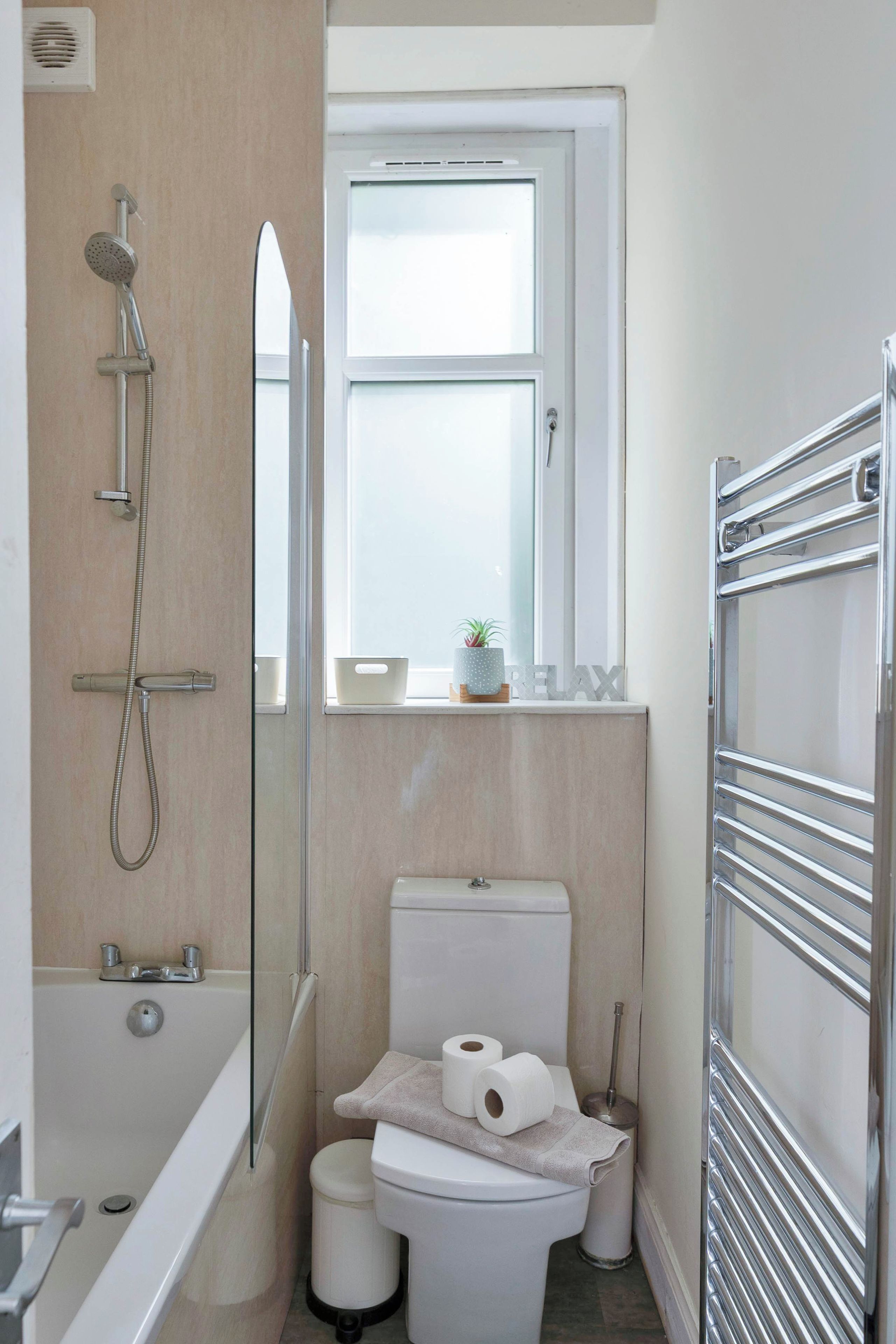 Shower, hair dryer, towels, shampoo
