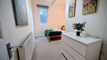 2 bedrooms, desk, iron/ironing board, travel cot